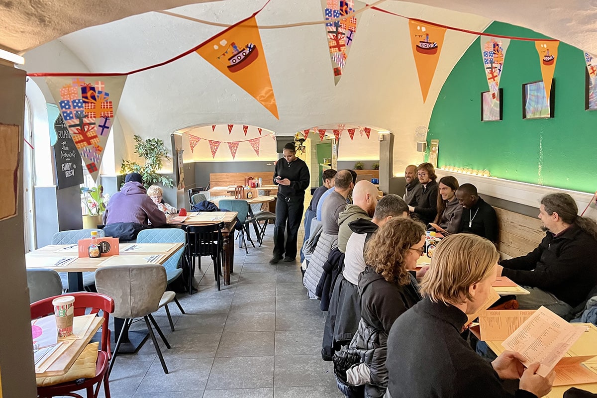 Team lunch indulging in Dutch pancakes in Utrecht